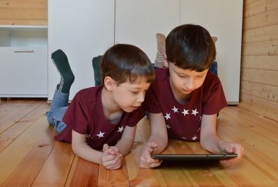 Norwegian Language Course for Children - Two Children with tablet learn Norwegian